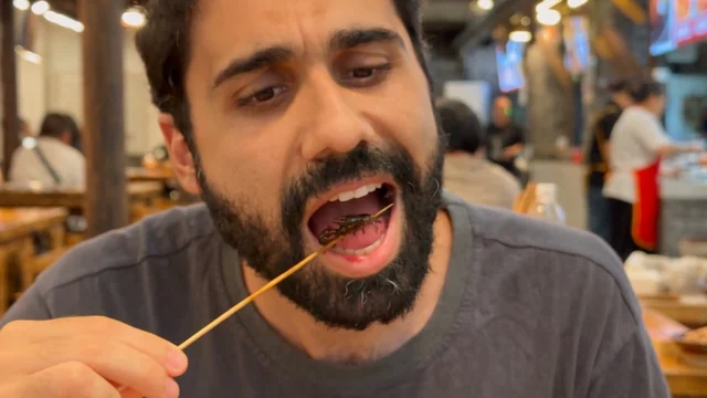 Beat 3: close-up, the scorpion at his open mouth.