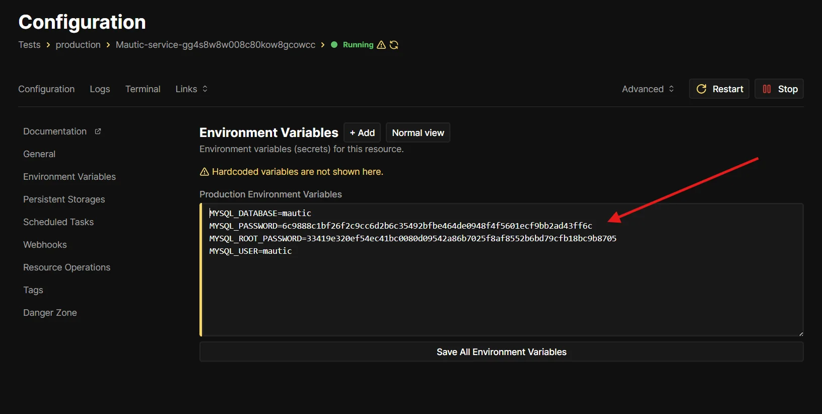 Coolify Environment Variables tab showing MYSQL_DATABASE, MYSQL_PASSWORD, MYSQL_ROOT_PASSWORD, and MYSQL_USER pasted into the Production Environment Variables editor.